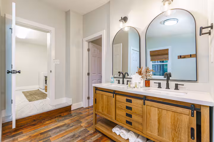 Bright shared bathroom with a double vanity